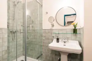 Bathroom with a glass shower and washbasin