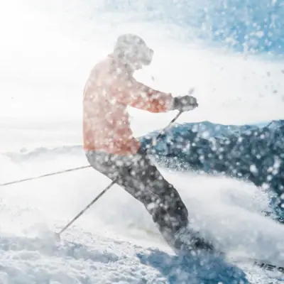 A person is skiing down a slope.
