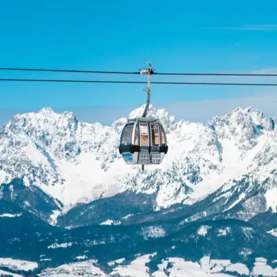 Cable car over a snow-covered mountain