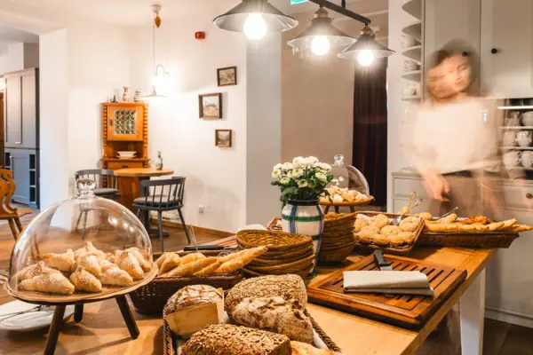 A table with snacks and pastries.