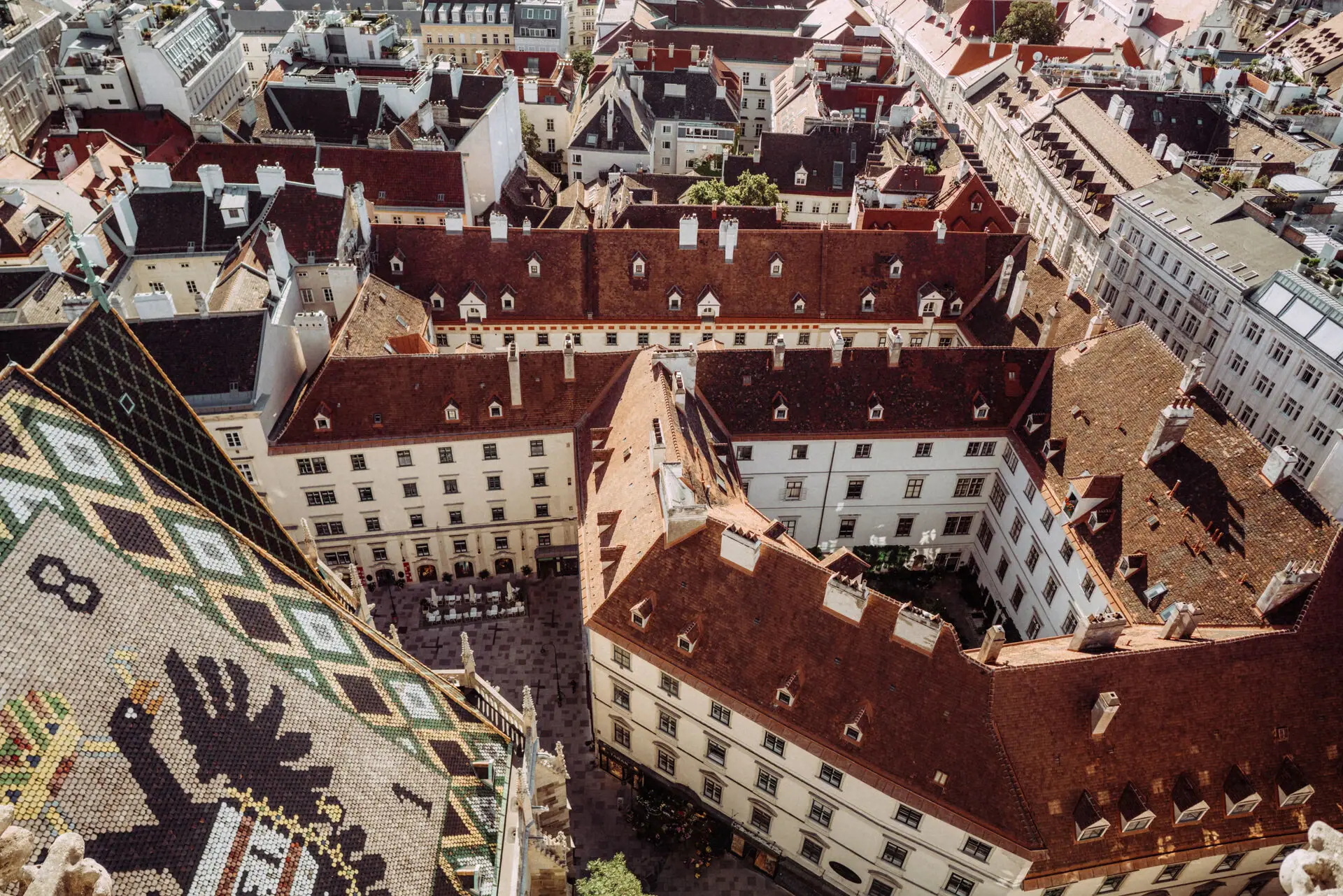 Aerial view of a city with buildings and houses.