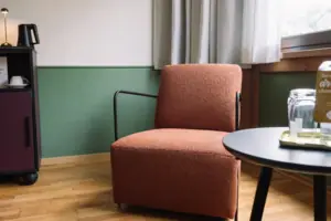 An armchair in a room.