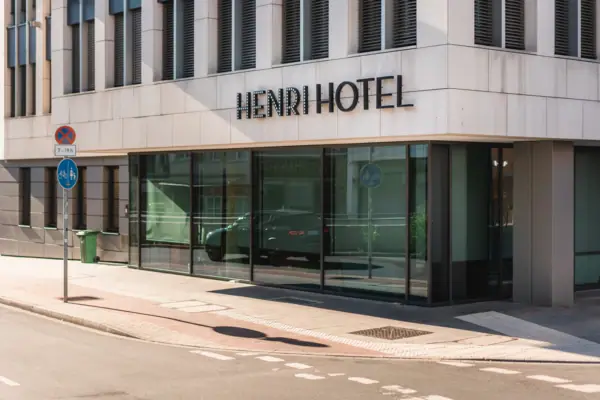 A building with glass windows and a modern facade.