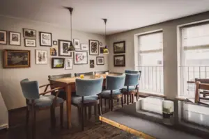 Dining area with a table and chairs.