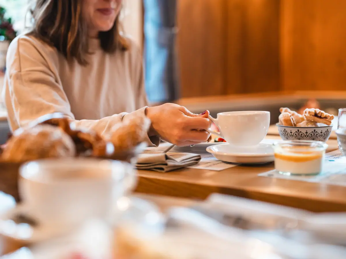 A woman at the breakfast table
