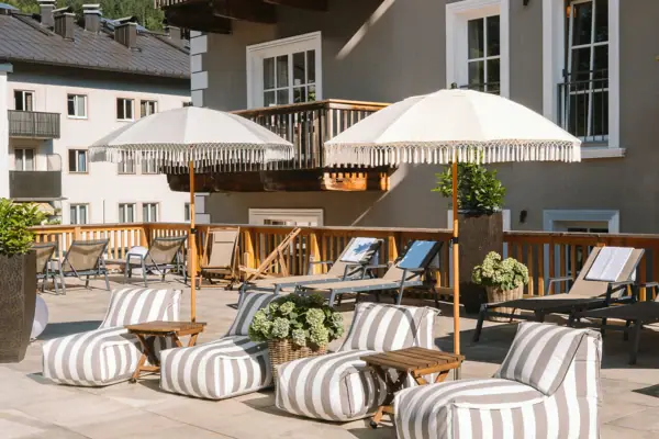 Terrace with chairs and parasols