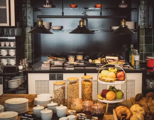 A kitchen with food on the counter.