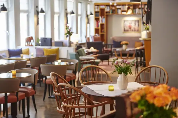 Tables and chairs in the lounge area