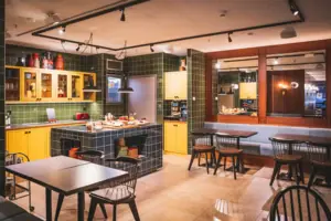 A room with tables and chairs.