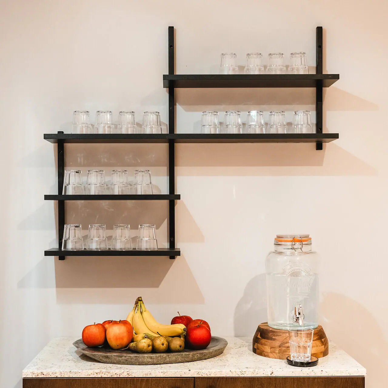 A fruit on a plate on a worktop.