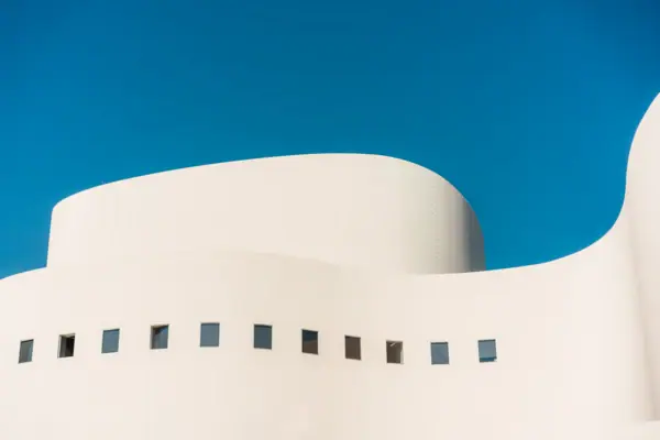 The Düsseldorf theatre from outside against a blue sky