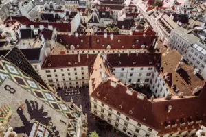 Aerial view of a city with buildings and houses.