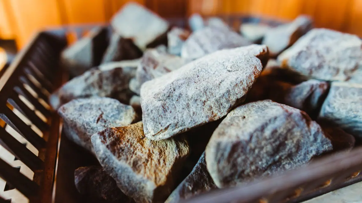A basket with a pile of sauna stones.