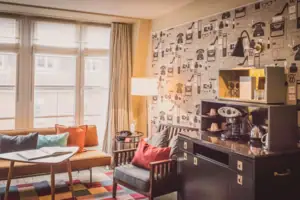 A room with a sofa and a coffee table.