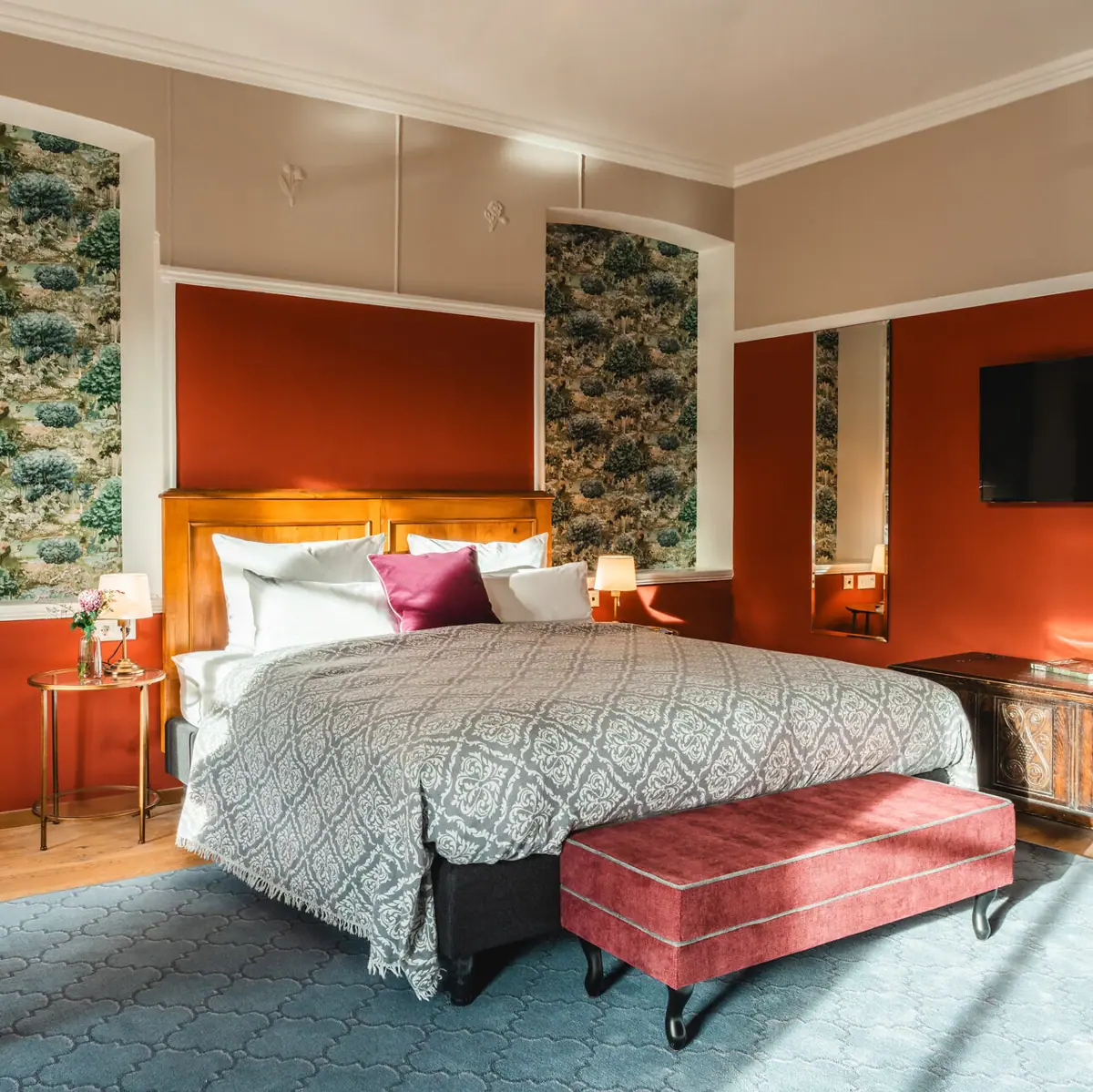 Bedroom with a bed and a television.