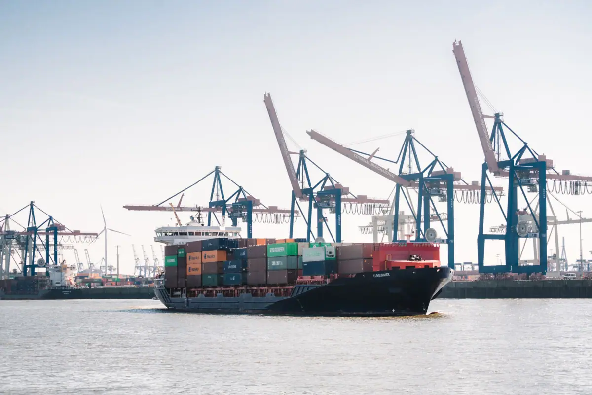 A large container ship on the water.