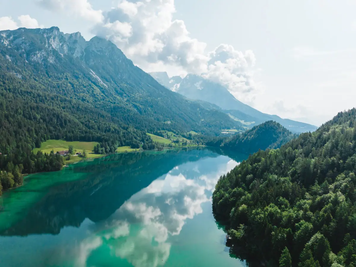 A lake surrounded by mountains.