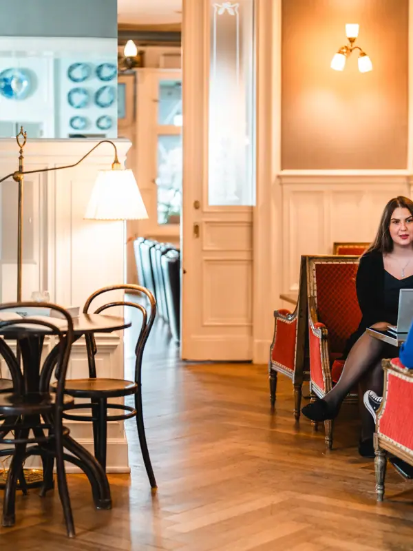 A group of women are sitting on chairs.