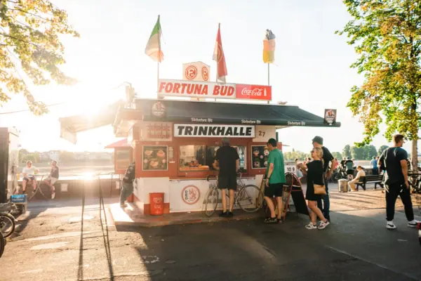 The Fortuna booth with people in front of it.