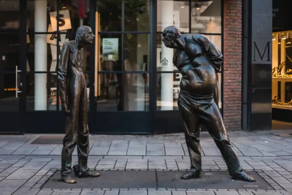 Bronze sculpture of a man and a woman