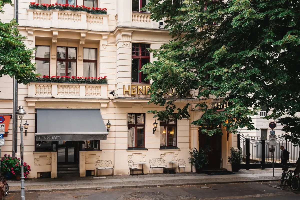 A building with windows and surrounding trees.