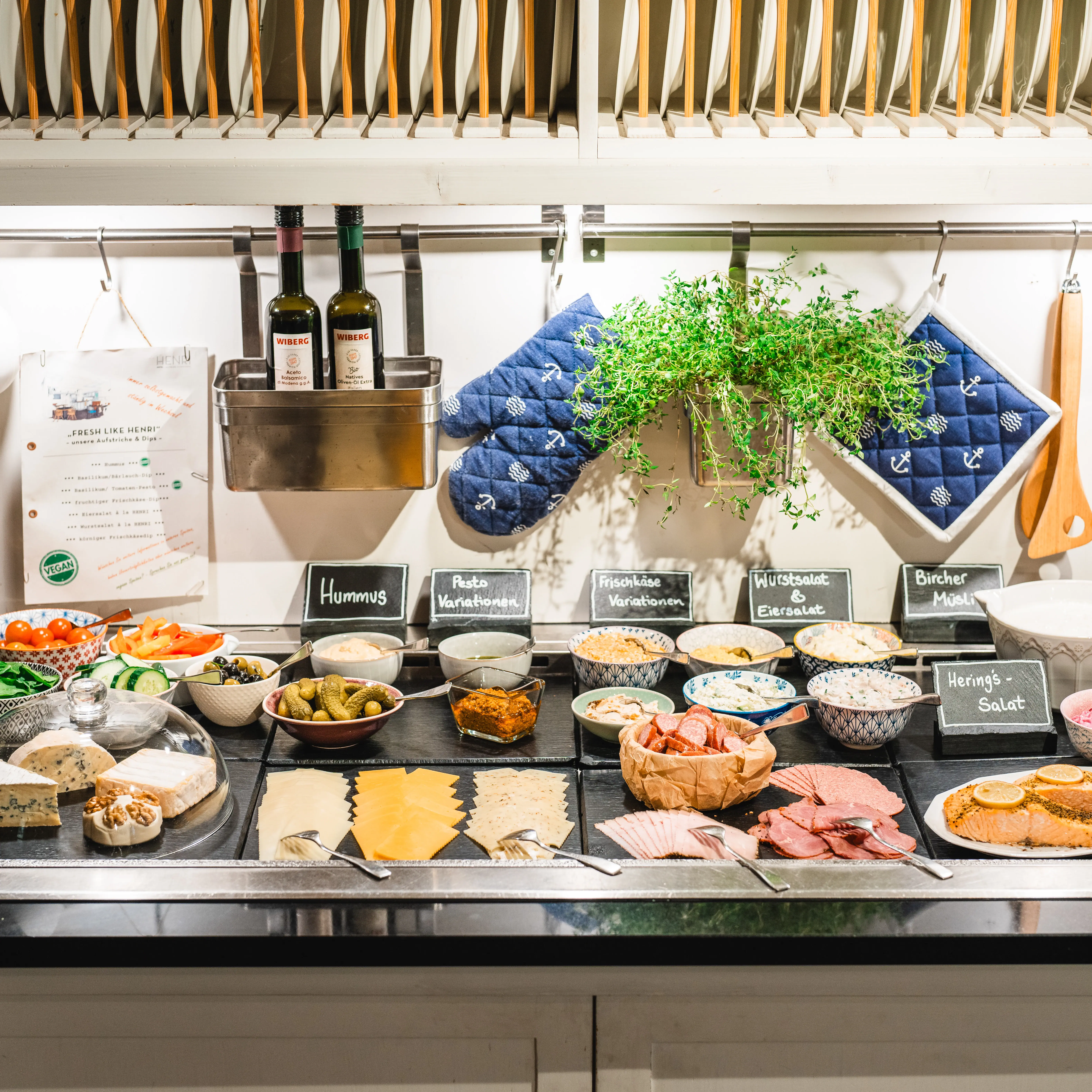 Breakfast buffet with a selection of cold meats and cheeses