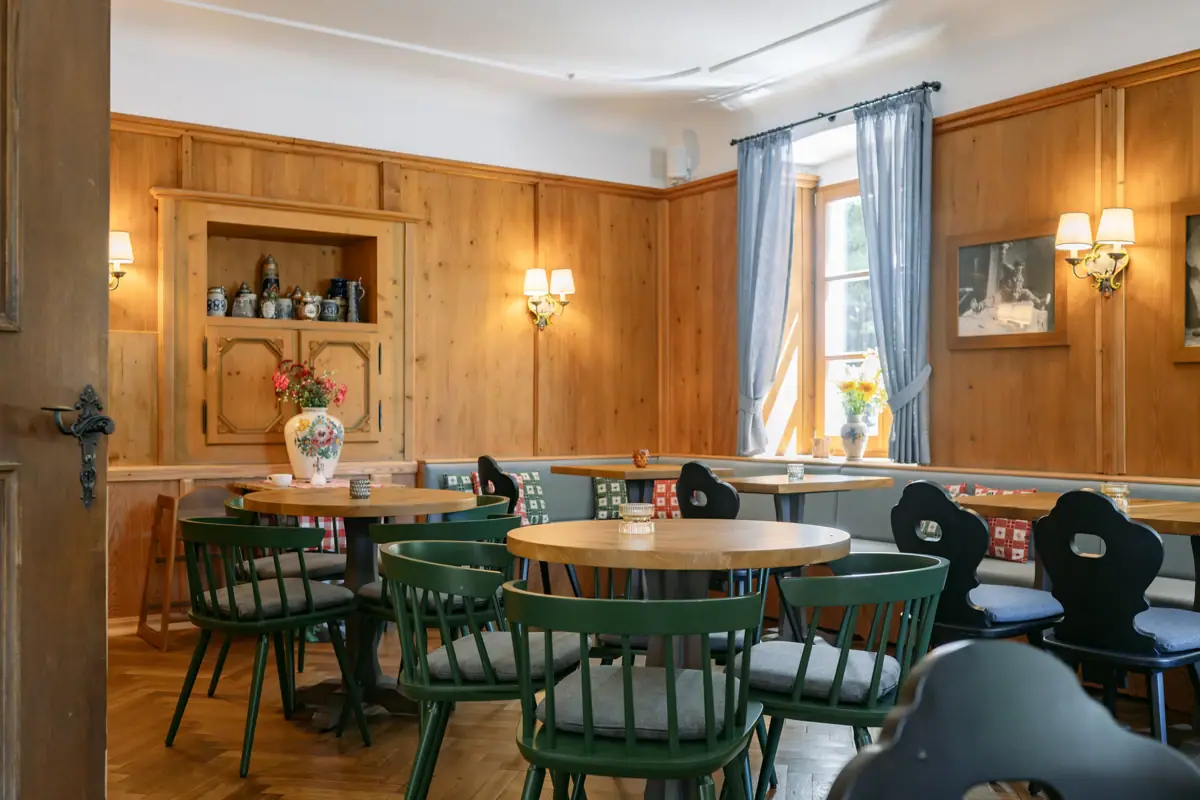A room with tables and chairs.