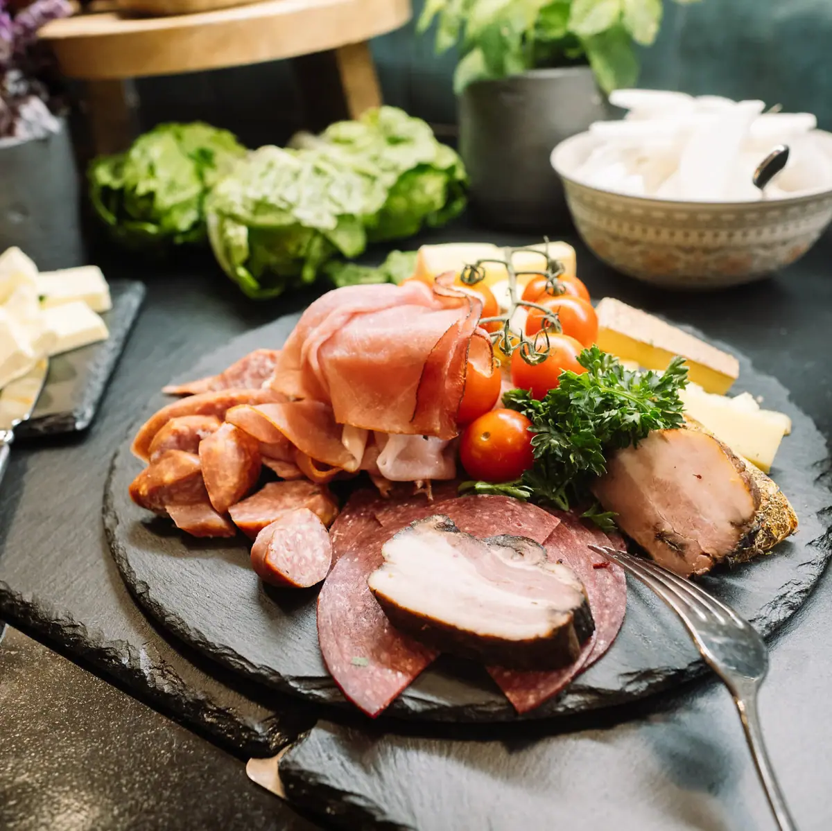A plate of elegantly arranged cuisine on a table.
