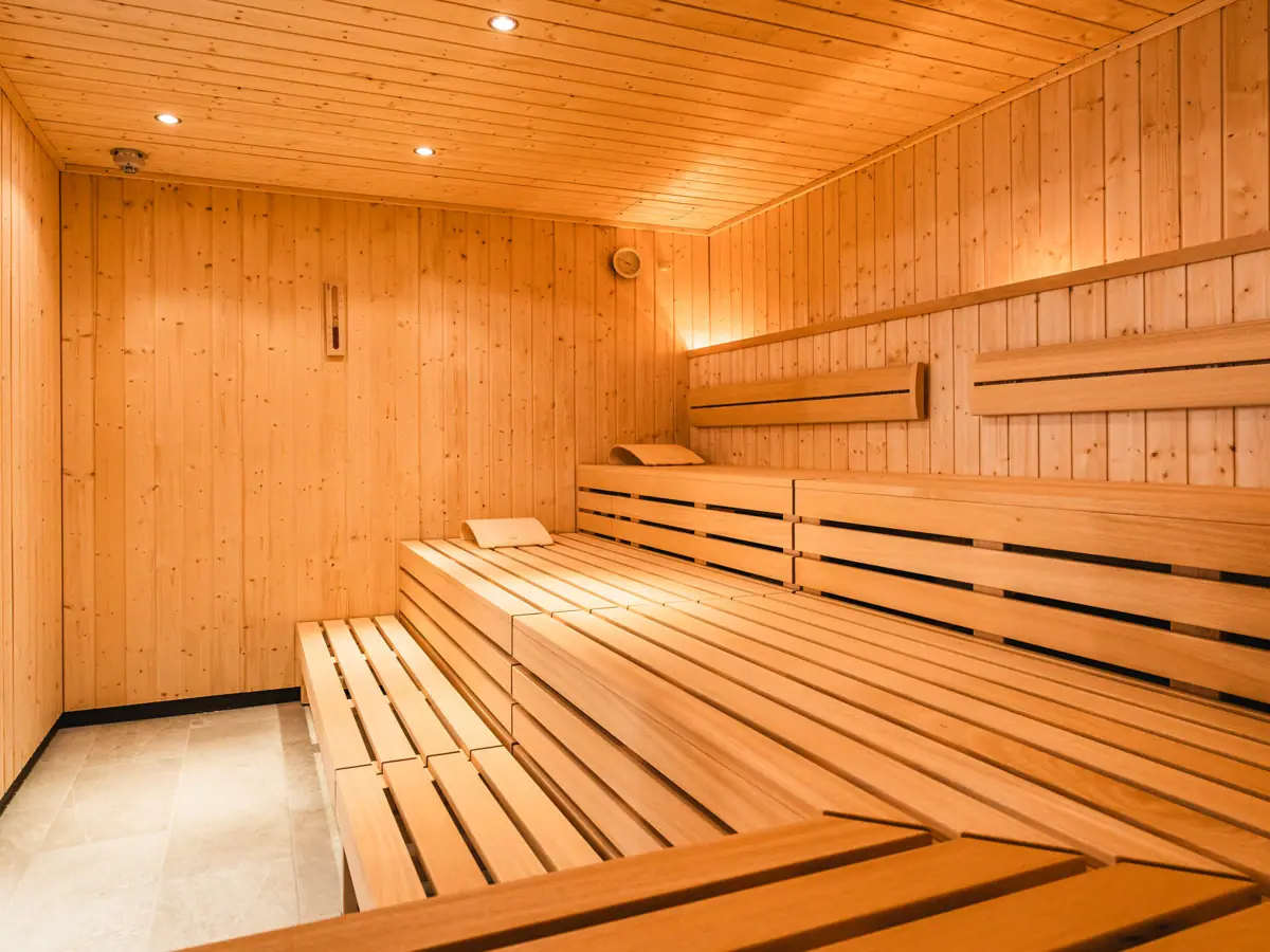 Wooden sauna with lighting.