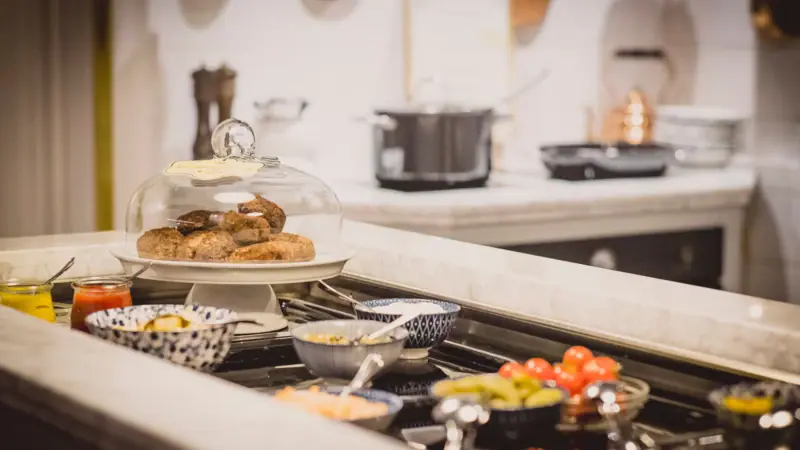 A counter with food on it.