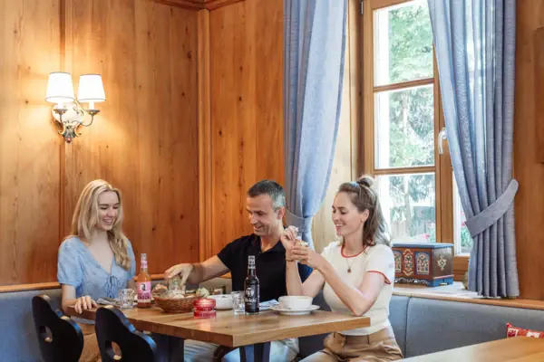 A group of people are sitting at a table.
