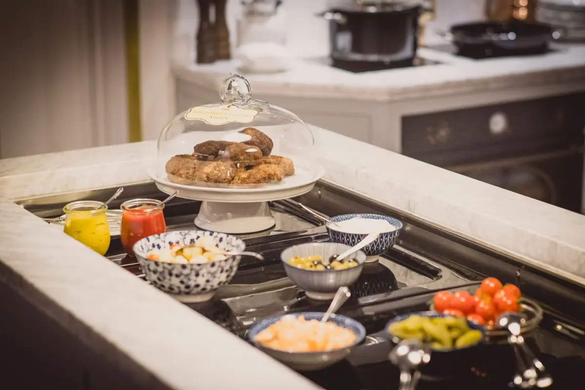 A table with various dishes on it.