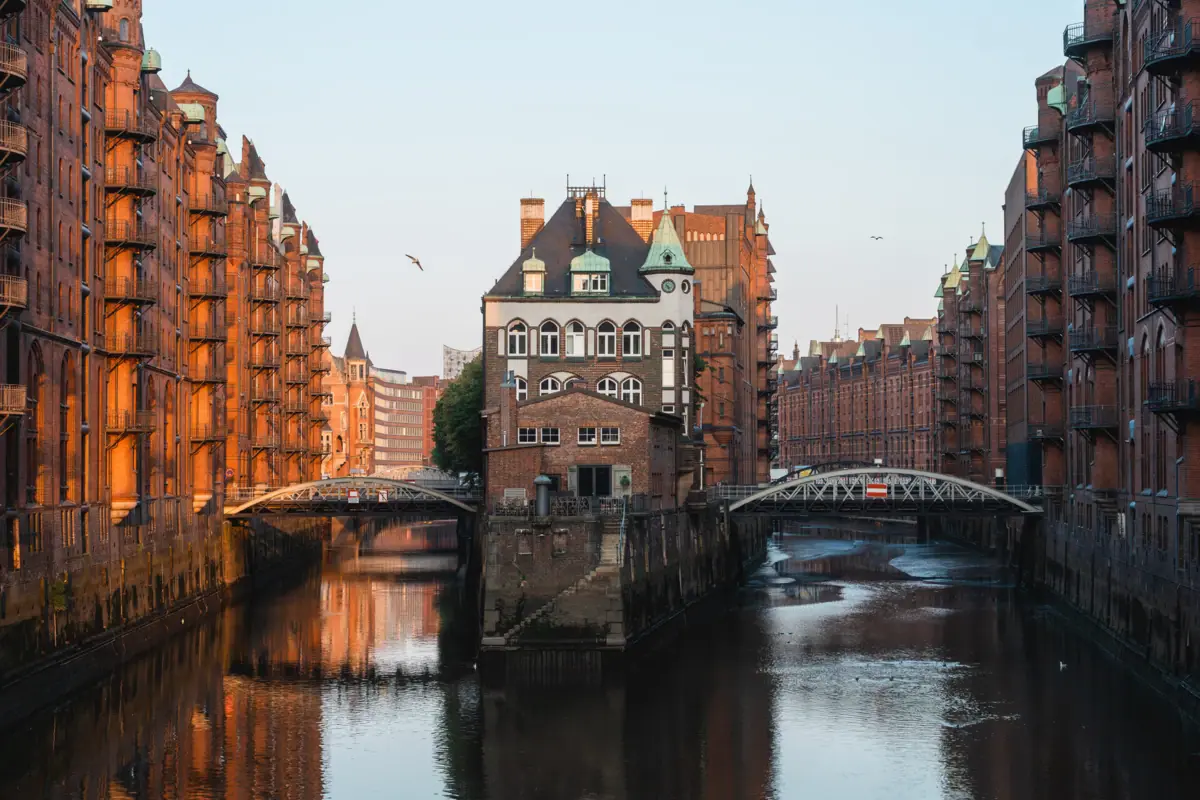 River with buildings and a bridge in the foreground.