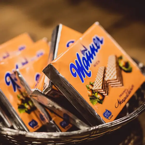 A basket of snacks in a bowl.