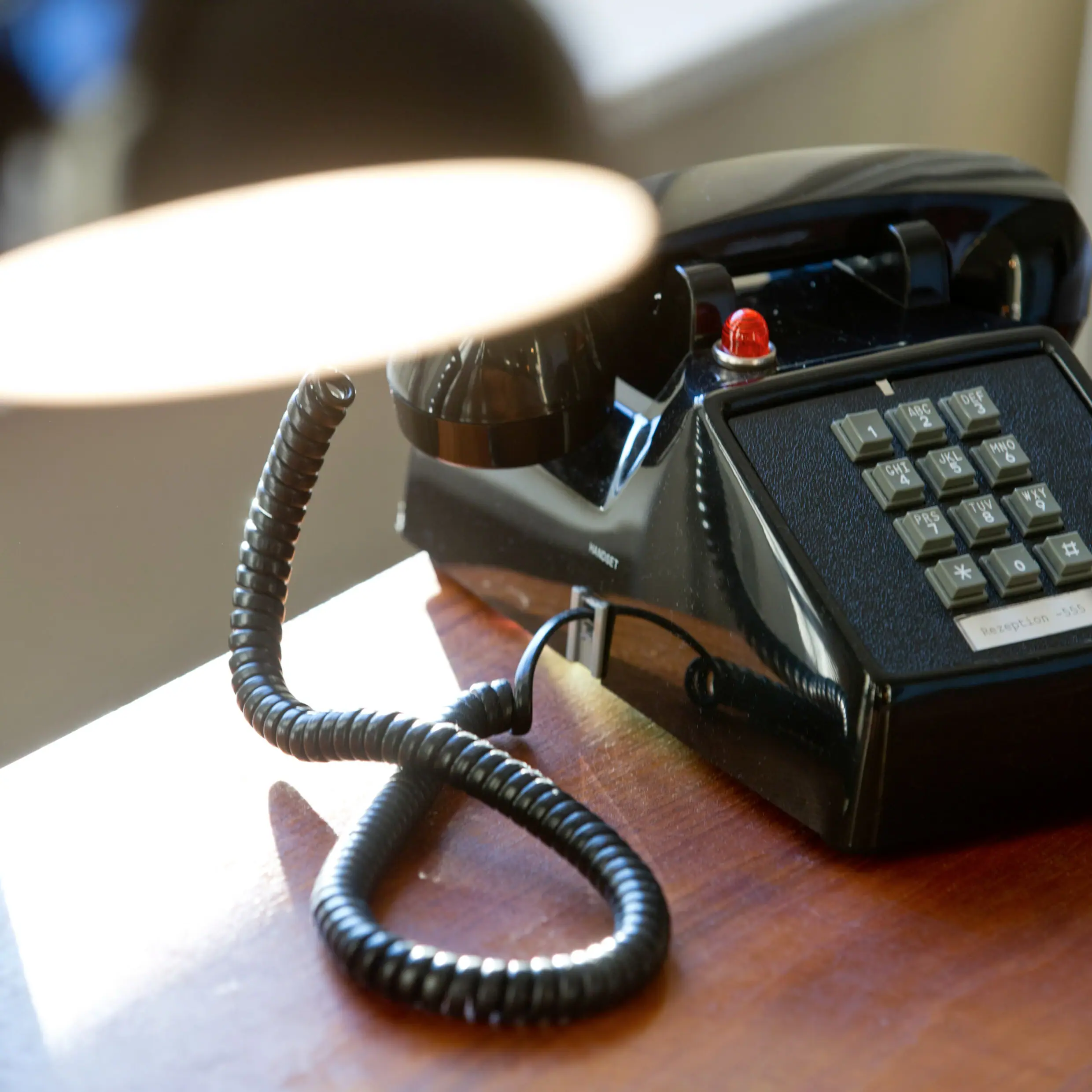 Retro telephone on a small table