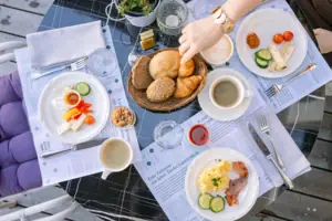 A breakfast table laden with various dishes.