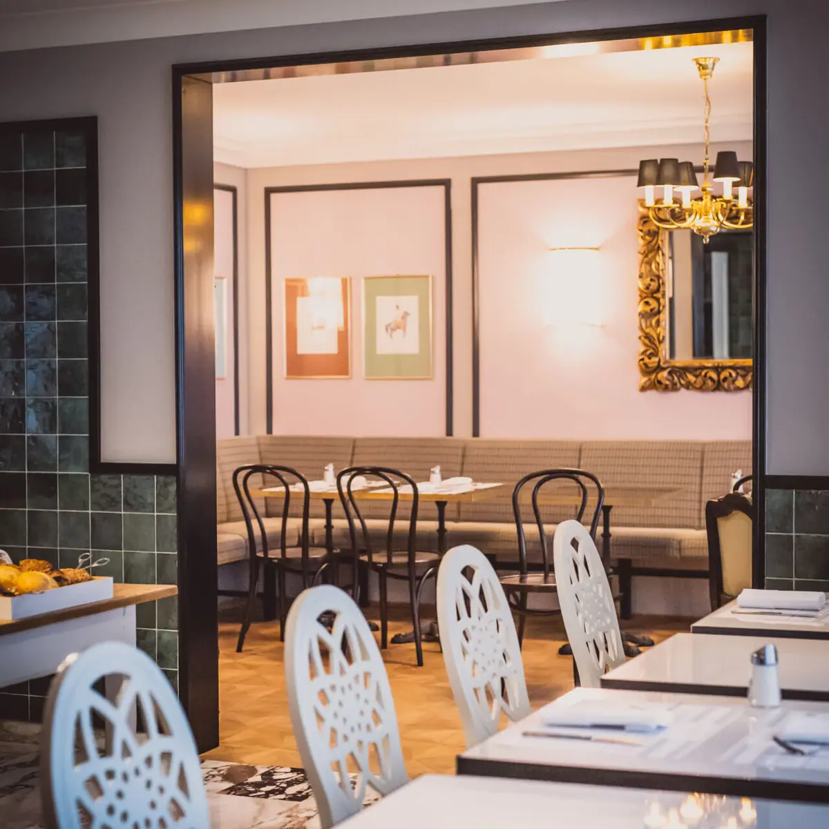 A room with tables and chairs.