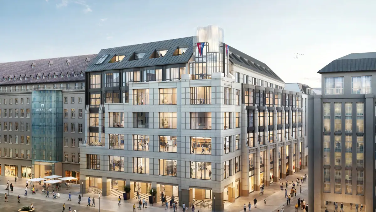 A group of people walk around the HENRI Hotel Leipzig.