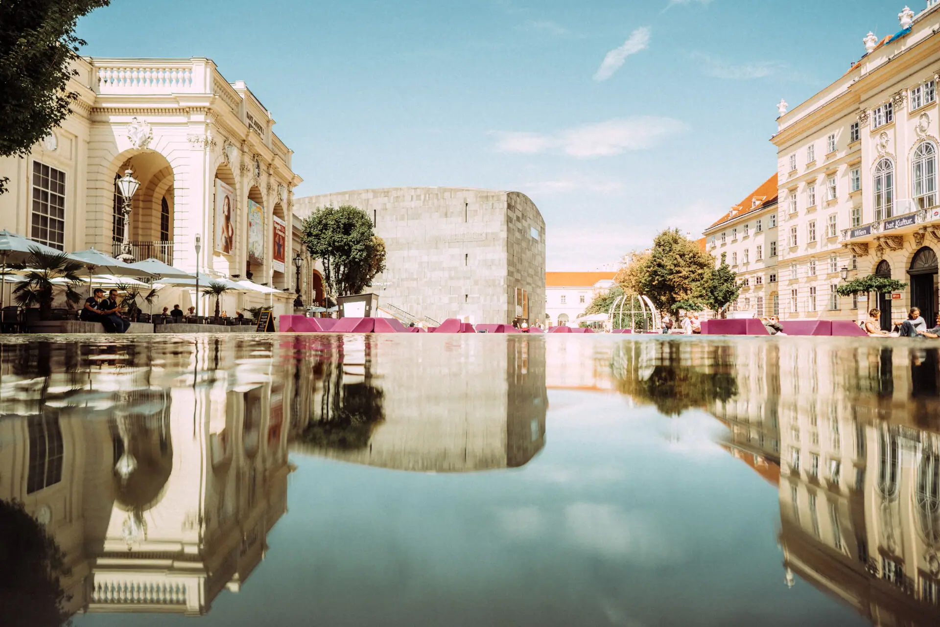 Reflection of buildings in a puddle