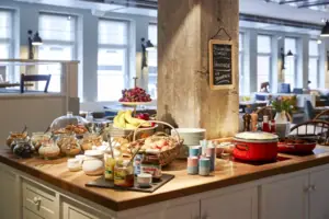 Kitchen island with muesli, cereals and jams.