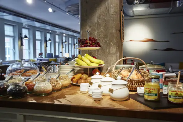 A table with various dishes and crockery.