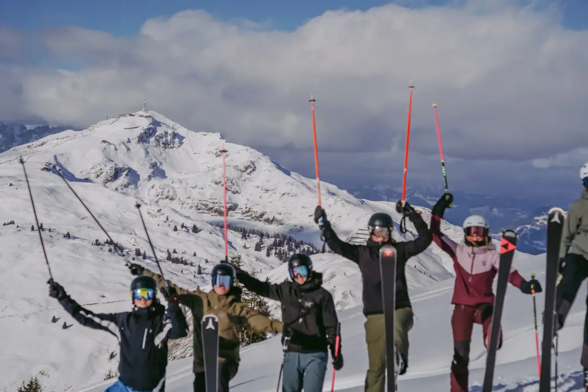 A group of people on skis on a snow-covered mountain.