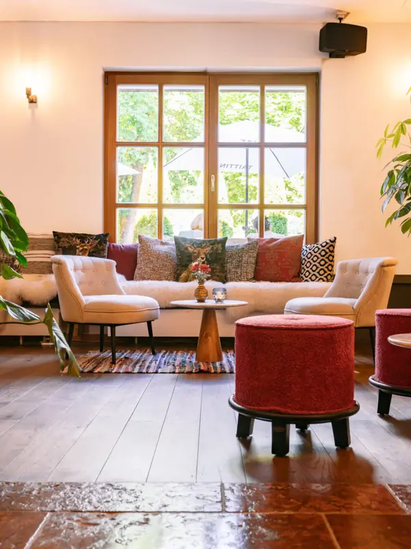 Living room with sofas and armchairs.