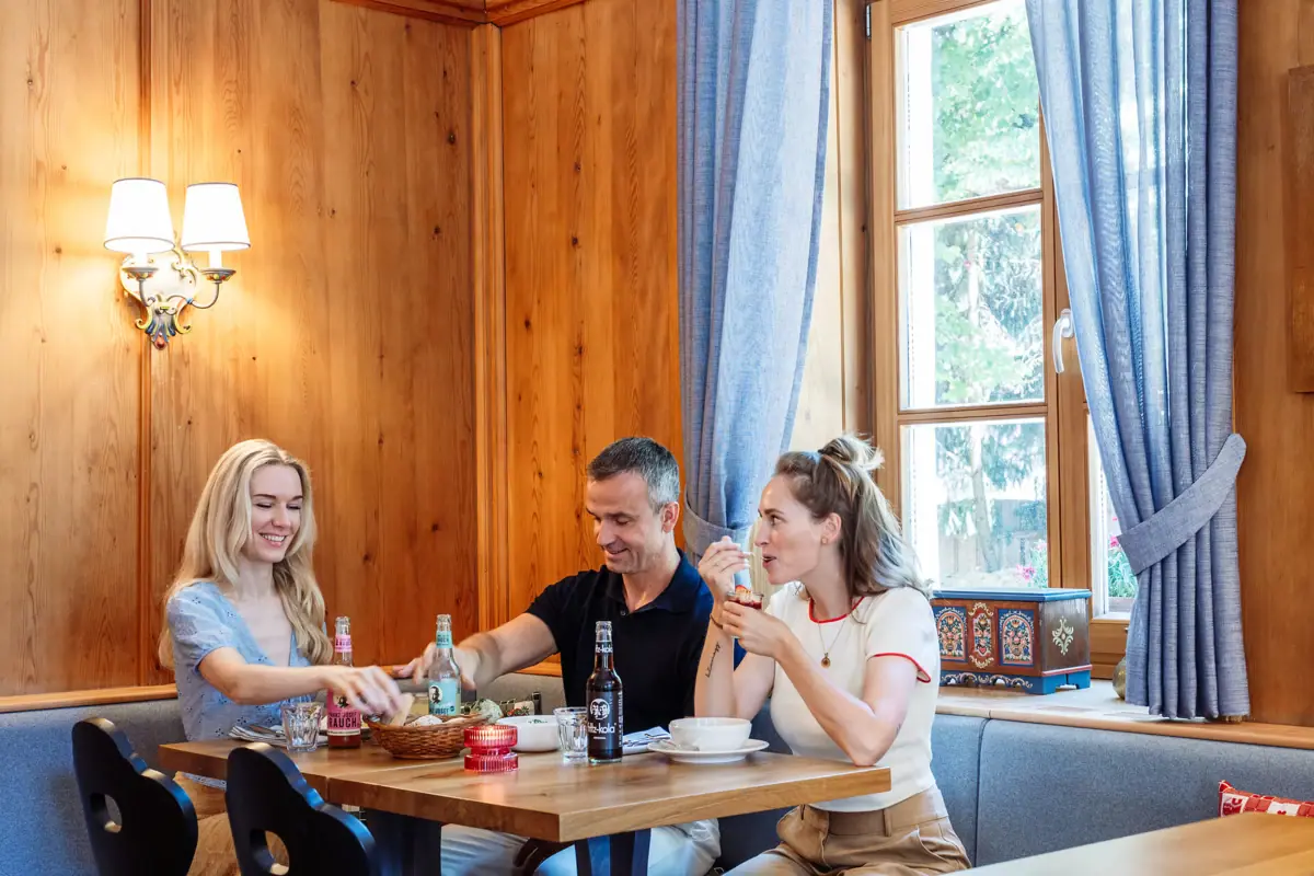 A group of people are sitting at a table.