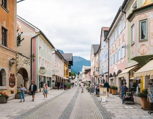 Street with buildings and people taking a walk