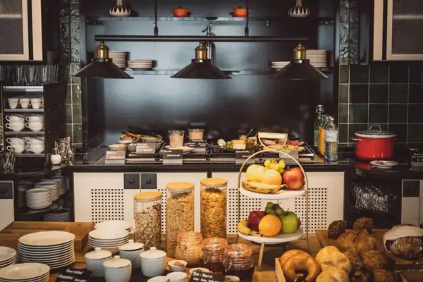 A kitchen with food on the counter.