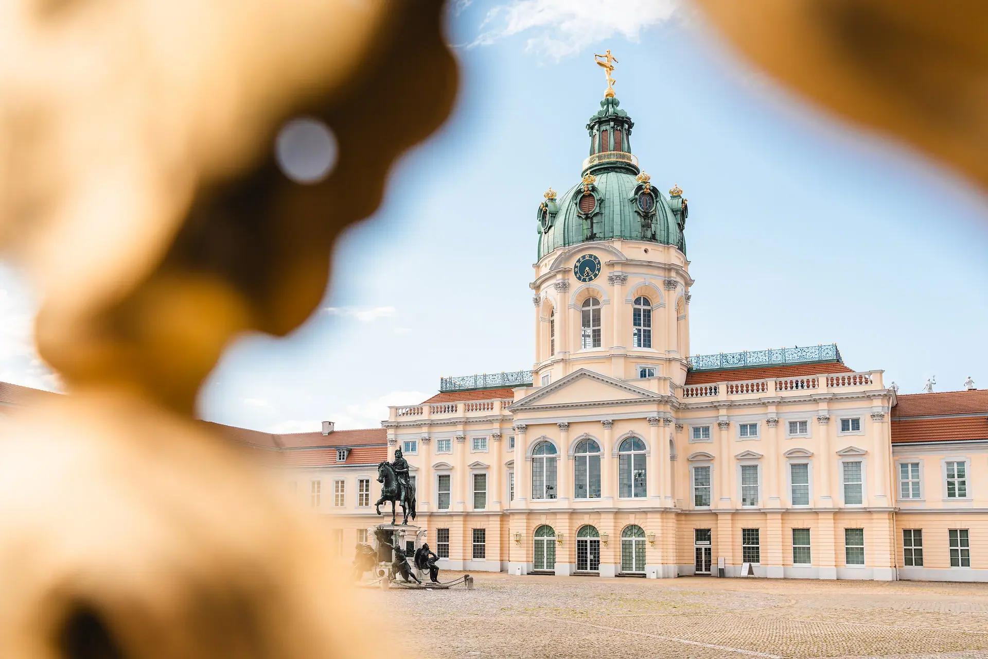 Charlottenburg Palace, with its dome and statue in the foreground