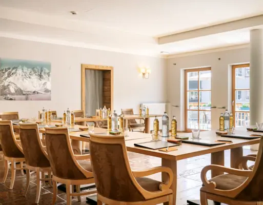 A room with tables and chairs.