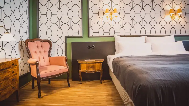 Bedroom with bed and chair