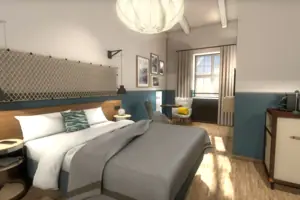 A bedroom with a bed and a chair.